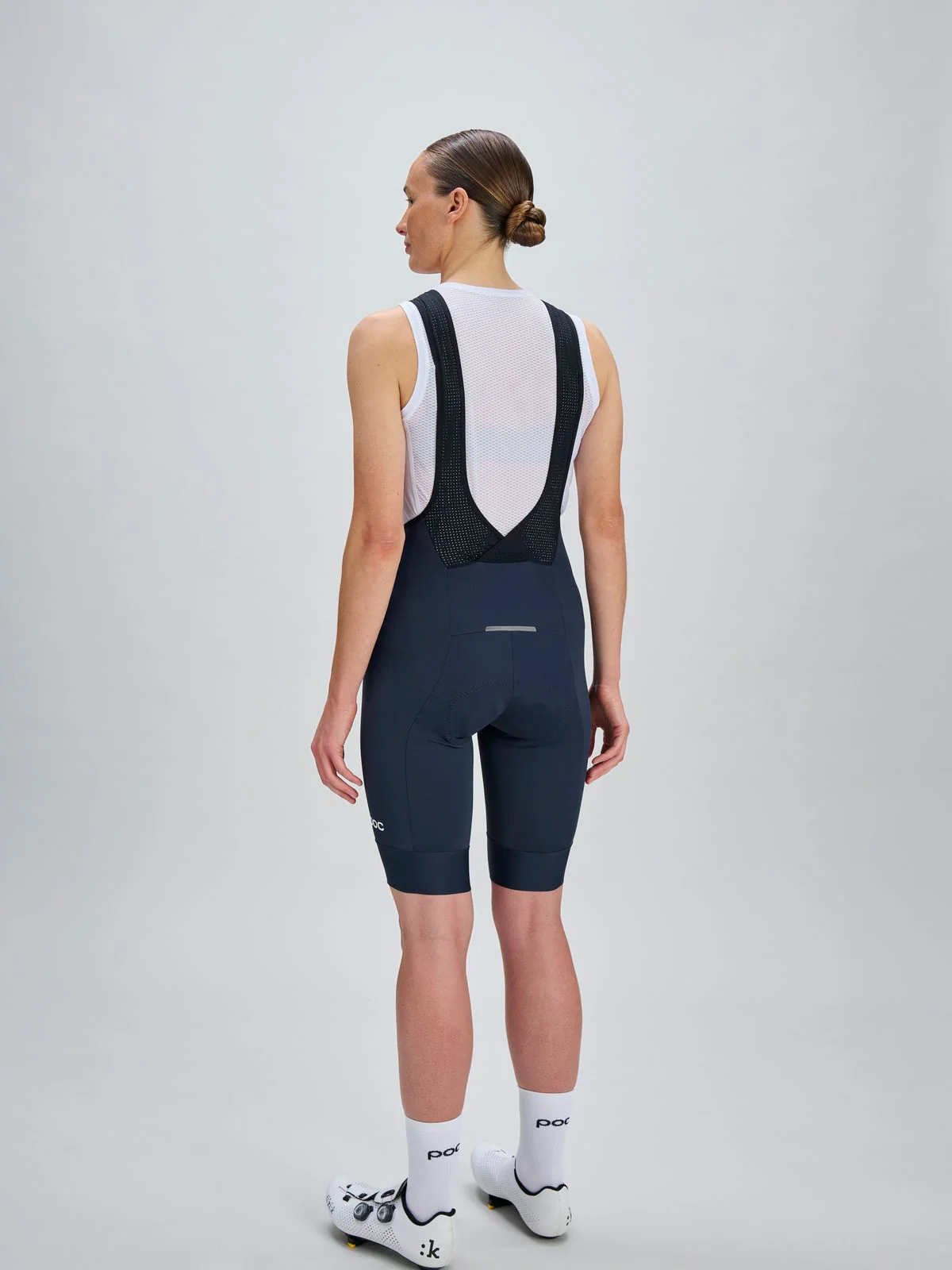 Spodenki rowerowe POC W's Cadence Bib Shorts - Apatite Navy - Image 3