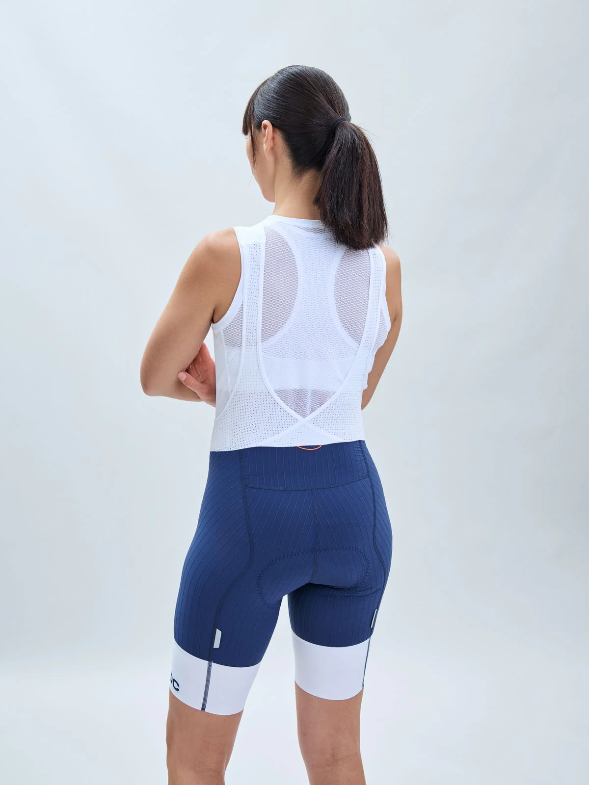 Spodenki rowerowe POC W's Raceday Bibshorts - Turmaline Navy/Hydr. White - Image 3